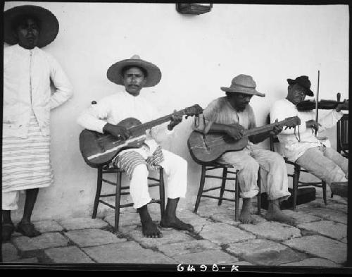 Maya men with musical instruments at Chichen Itza