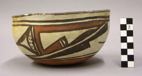 Bowl, polacca polychrome style c. int: zuni rain bird design; ext: linear design