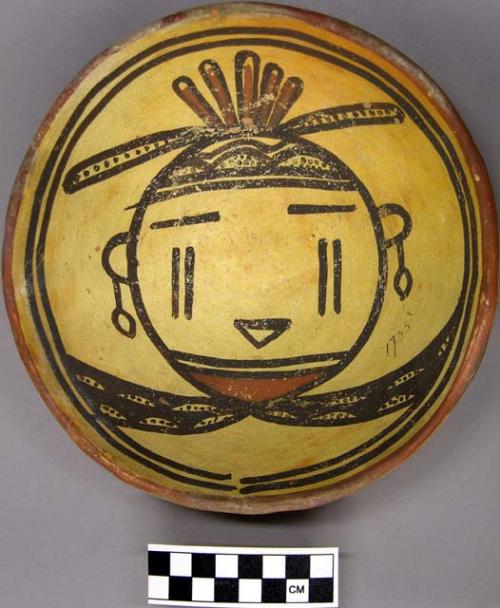 Bowl, polacca polychrome style c. int: kachina design; ext: slipped, no design.