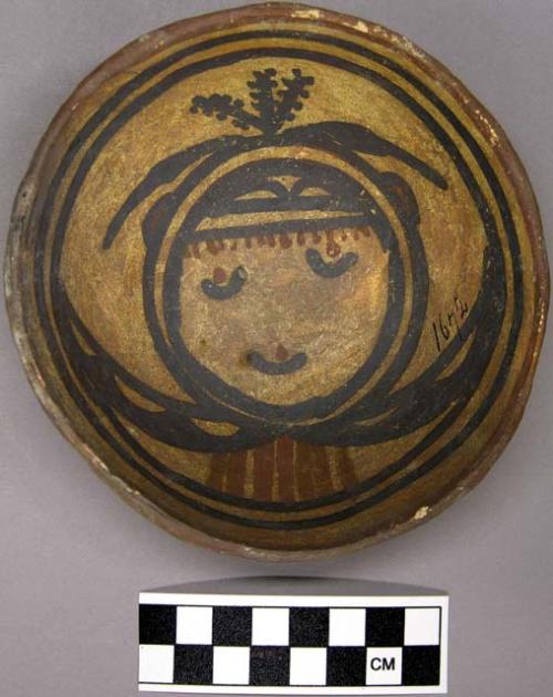 Bowl, polacca polychrome style c. int: clown design; ext: slipped, no design. 5.