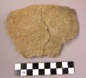 Ceramic sherd, shell tempered, corded design