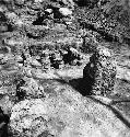 Shrine with feet and sacrificial stone