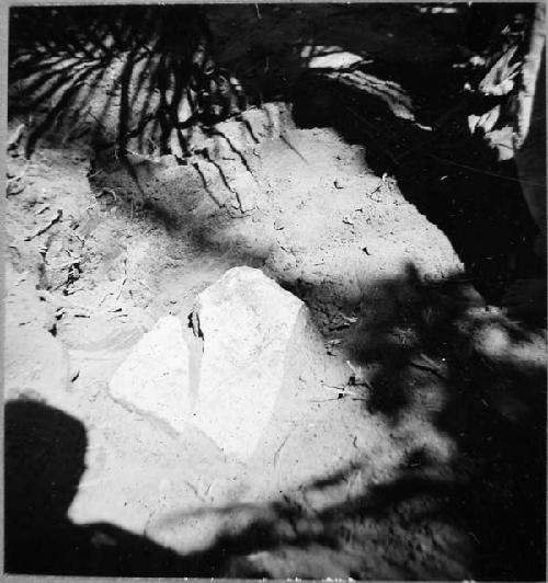 Limestone tablet broken in 2 parts, as found in situ on SE side of platform 53-2