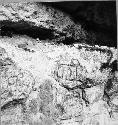 Rock carving on East wall of cenote. South end