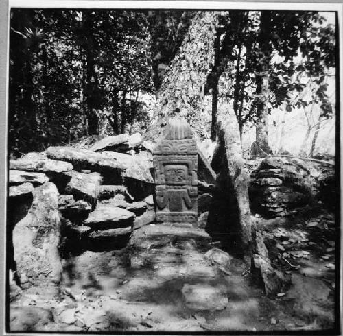 Carved monument in modern shrine on Str. 1.