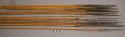 18 bamboo arrows - carved and raffia wrapped tips, white paint on base of tips (