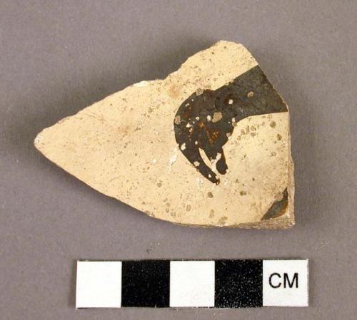 Zoomorphic sherd--bird head. Jeddito black-on-yellow