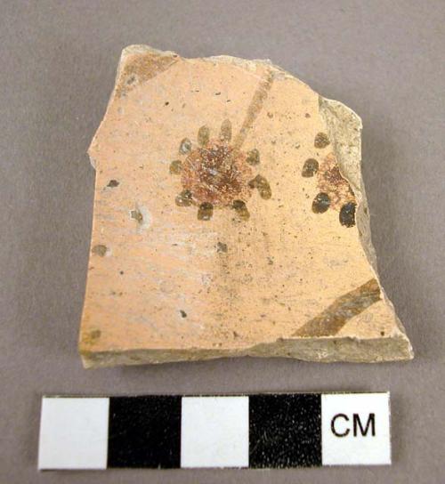 Potsherd showing flower