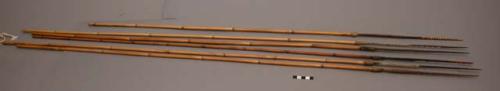 Bamboo arrows - tips carved and wrapped with raffia (approx. 45")