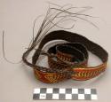 Basketry belt - brown with red and yellow designs