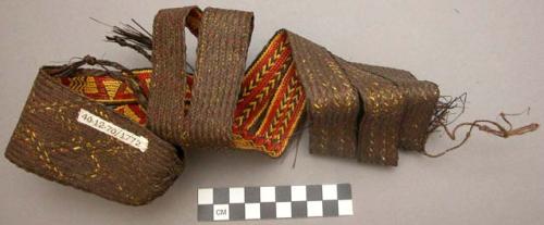 Wide basketry belt with slit at sides--brown with red and yellow design