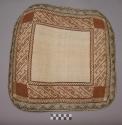 Mat, woven plant fiber, square, rounded corners, dark and brown borders
