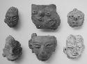 Figurine heads (5), face form neckless jar (1)