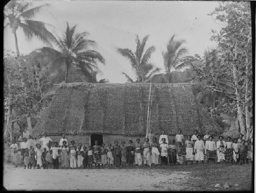 Native People in front of Hut