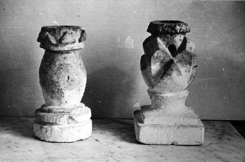 Two limestone candlesticks (?)