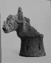 Small pedestal-base effigy vessel