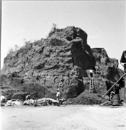 South side showing cutting by brickyard workmen, Mound E-III-3