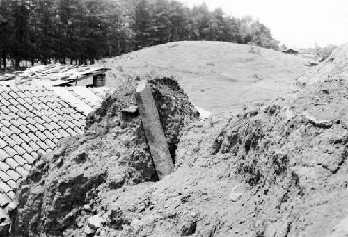 Mound D-III-13; West side. Plain stela in situ