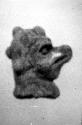 Ceramic figurine head, zoomorphic