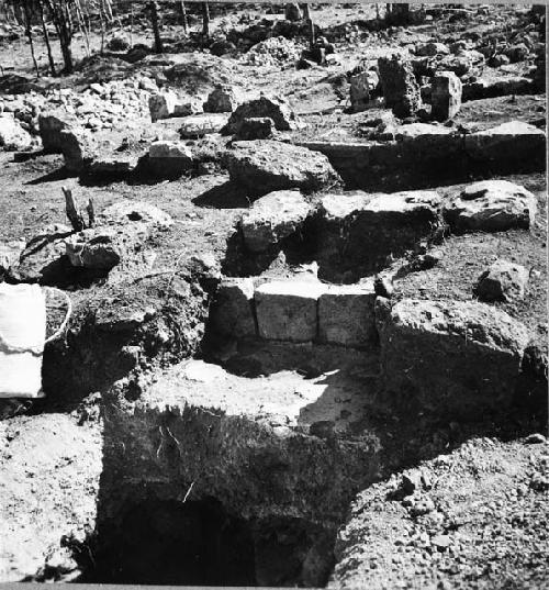 Str. Q-59  from W. showing E-W trench exposing several plaza floors