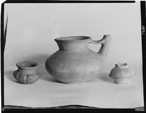 Two Small Vessels and Vessel with Spout