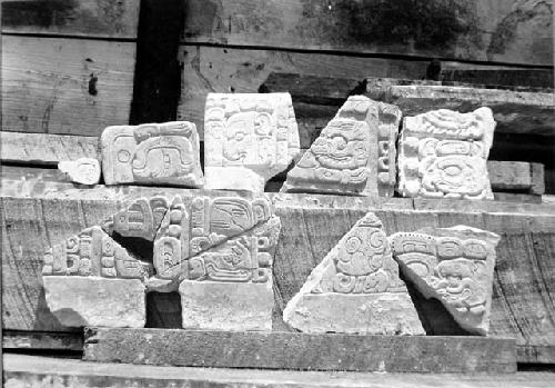 8 stone fragments with hieroglyphic texts.