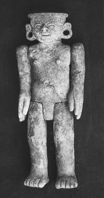 Pottery doll with articulated arms and legs