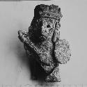 Pottery figurine of man with shield and spear-white coated with colored