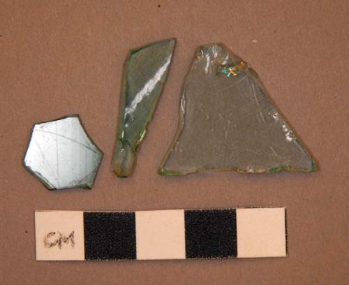 Glass, flat, clear and green shards