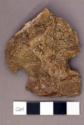 Chipped stone, quartz arrow head-like stone, possibly fake