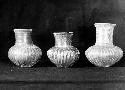 3 Plumbate jars, all have gadrooned bodies Gadrooning done from exterior.