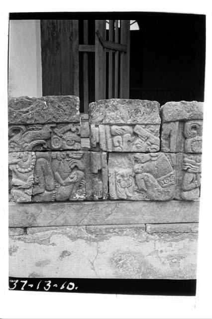 Hieroglyphic frieze stones with two seated figures from top of Mound 26