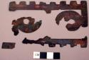 Metal, copper sheet ornament fragments, notched edges with round elements in center