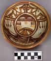 Bowl, polacca polychrome style c. int: kachina design; ext: slipped, no design.