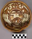 Bowl, polacca polychrome style c. int: kachina design; ext: slipped, no design.