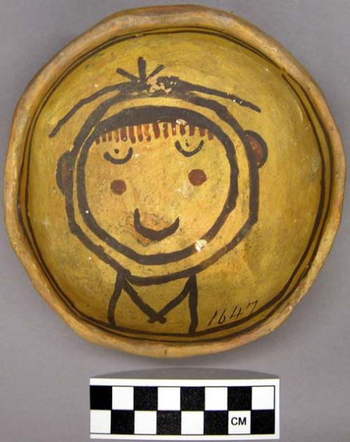 Bowl, polacca polychrome style c. int: clown design; ext: slipped, no design. 4.