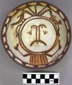 Bowl, polacca polychrome style c. int: clown design; ext: slipped, no design. 6.