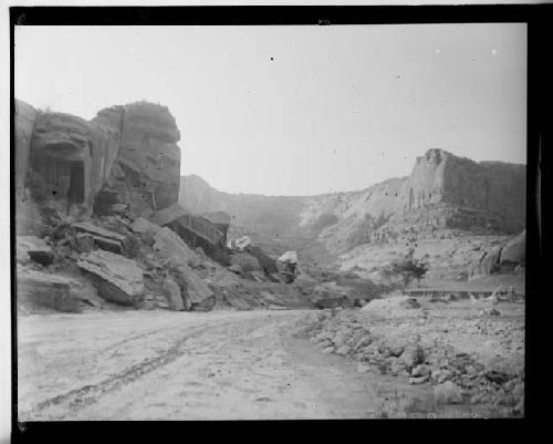 Saga-ot-so-see Canyon -- View about one mile from mouth showing caves near rim