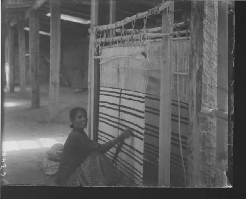 Woman making textile