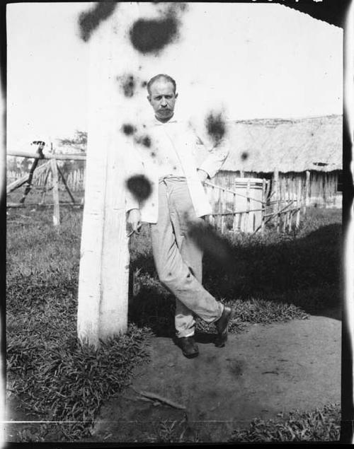 Man in front of building