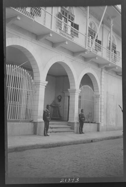 Guards in front of building