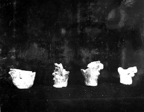 4 small pottery effigy incensario-like vessels with crudely modeled