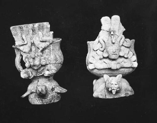 Front view of 2 pottery censers (?), both of Lot A-95 a, resting on a turtle, b,