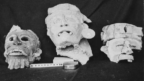 3 Effigy incensario heads Str. R-86, Burial Cist II.  (see also 55-30-80).