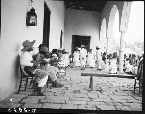 Maya men with instruments at Chichen Itza