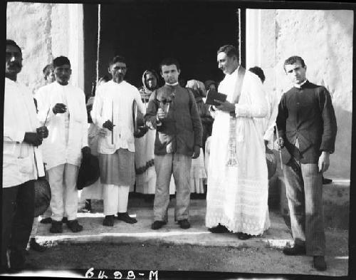 Maya men in front of church at Chichen Itza