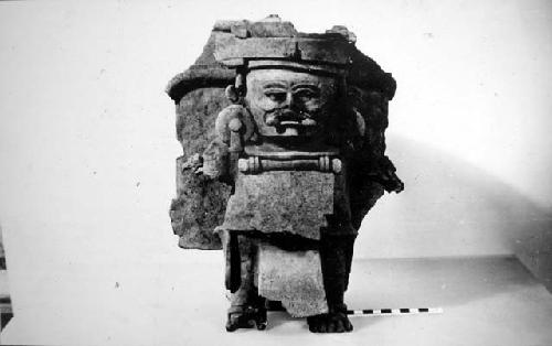 Ceramic vessel, standing anthropomorphic figure attached