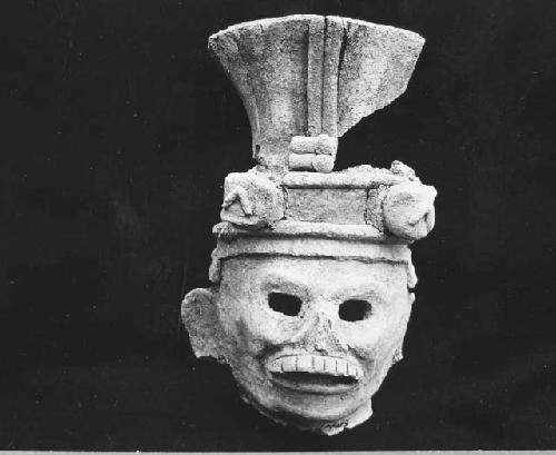 Large pottery head, probably incensario - probably, death head.