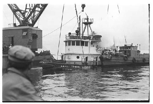 U.S. Army tugboat being raised