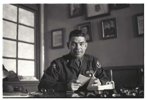 Portrait of Colonel Hagerty sitting at desk